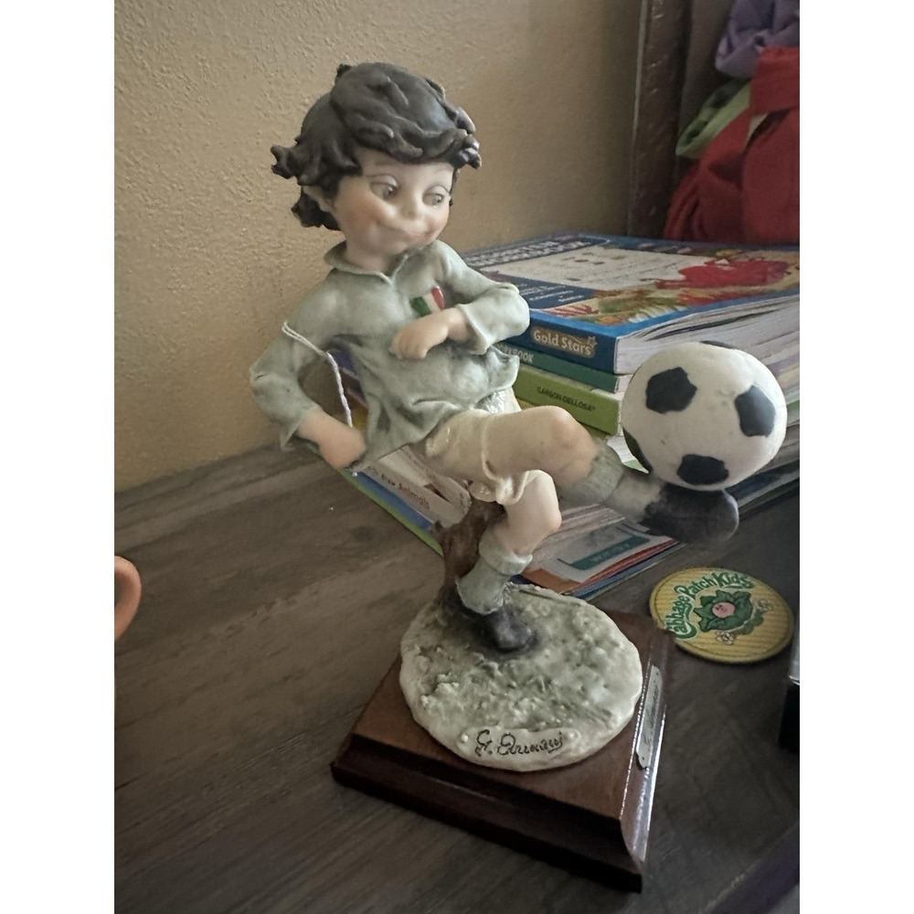 Guiseppe Armani 1982 Italian Boy Kicking Soccer Ball Made In Italy Green Eye